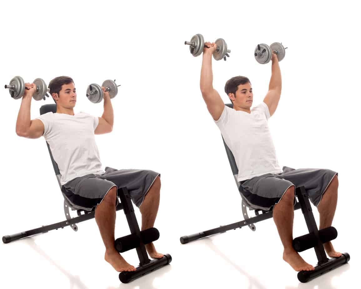 An Introduction To Resistance Training 2 Young man lifting weights. Studio shot over white.
