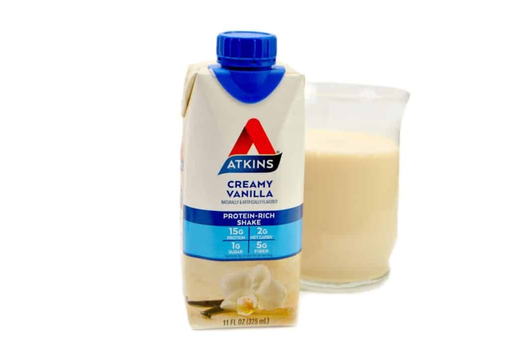 The Beginner's Guide to the Atkins Low-Carb Food List 2 Atkins Protein-Rich Shake-Creamy Vanilla (Bottle and glass)