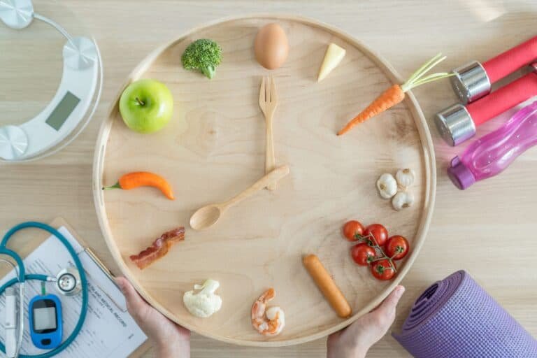 Intermittent fasting IF diet concept with 16:8 hour clock timer