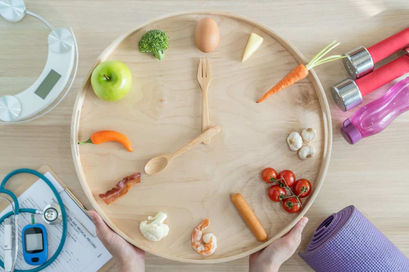 Intermittent Fasting And Exercise: Finding the Right Balance for Sustainable Results 1 Intermittent fasting IF diet concept with 16:8 hour clock timer
