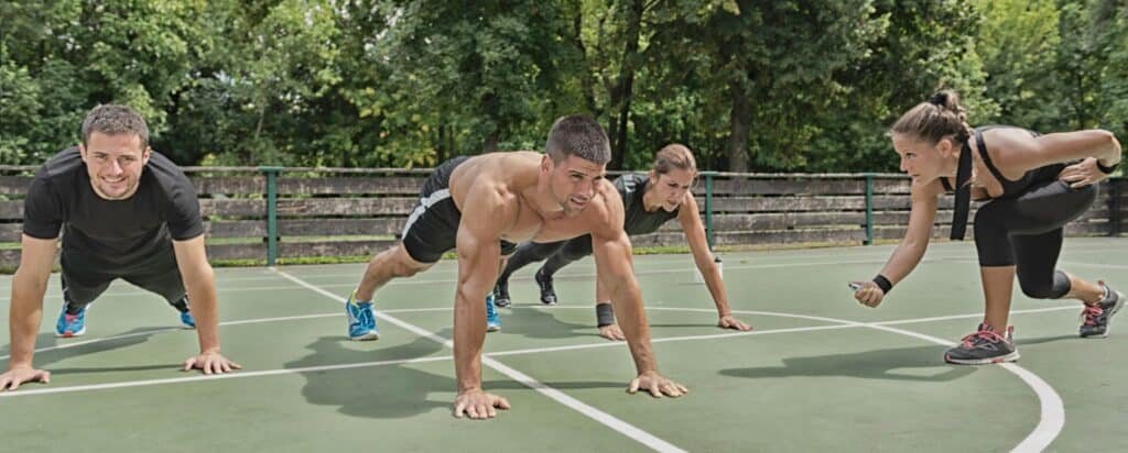 The Incredible Benefits Of Circuit Training For Weight Loss Explained 3 Male athletes doing push ups