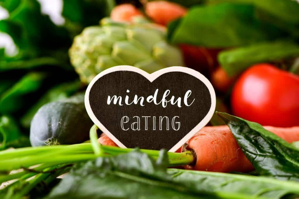 Understanding Mindful Eating: A Practice For Healthy Living 5 Raw vegetables and text mindful eating