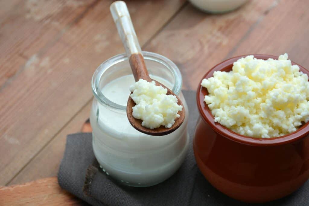 Full of keffir, milk and yogurt cups liquid