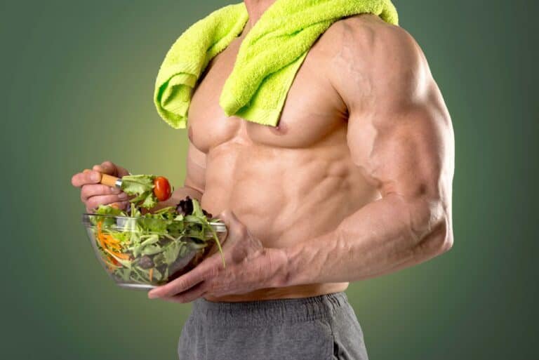 Healthy man eating a salad