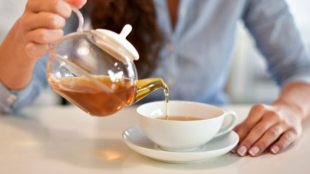 Health Benefits of Green Tea and Honey: A Dynamic Duo for Your Wellness Routine 6 Woman drinking tea, tea time